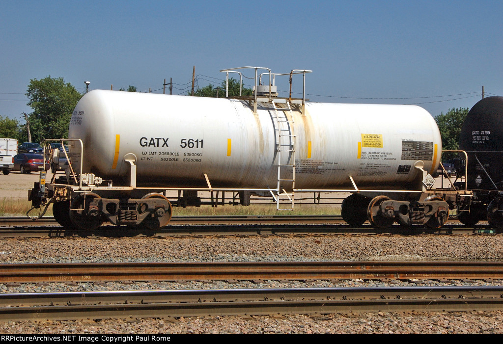 GATX 5611, acid tank car eastbound on the UPRR